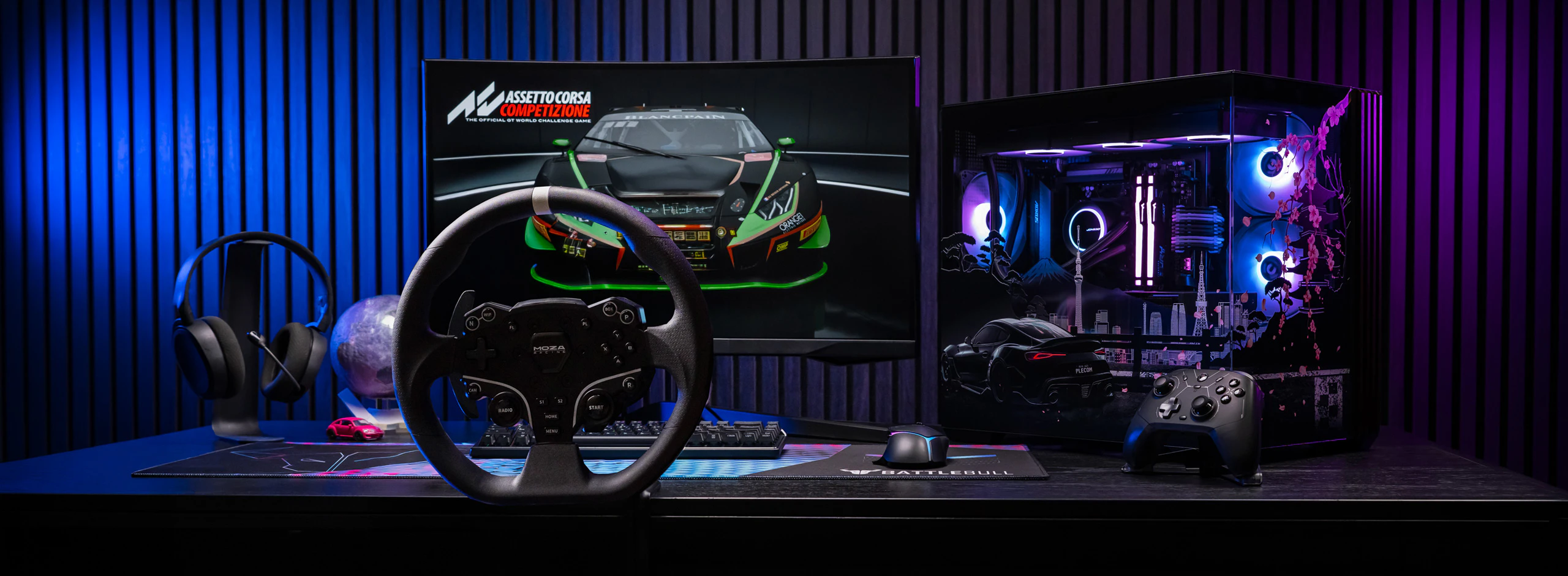 BattleBull racing setup with steering wheel, monitor and Hakone PC