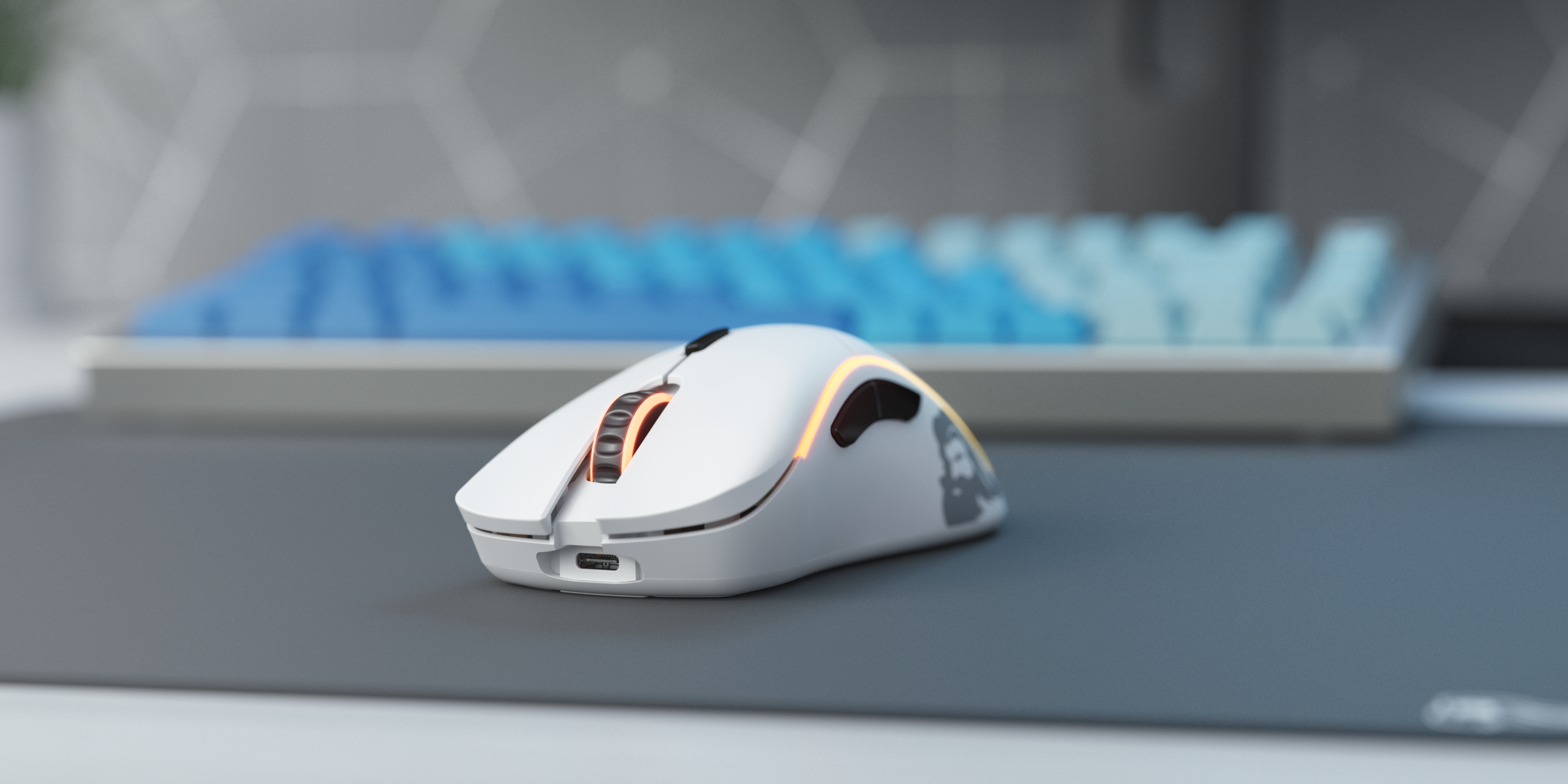 A large marketing image providing additional information about the product Glorious Model D Ergonomic Wireless Gaming Mouse - Matte White - Additional alt info not provided