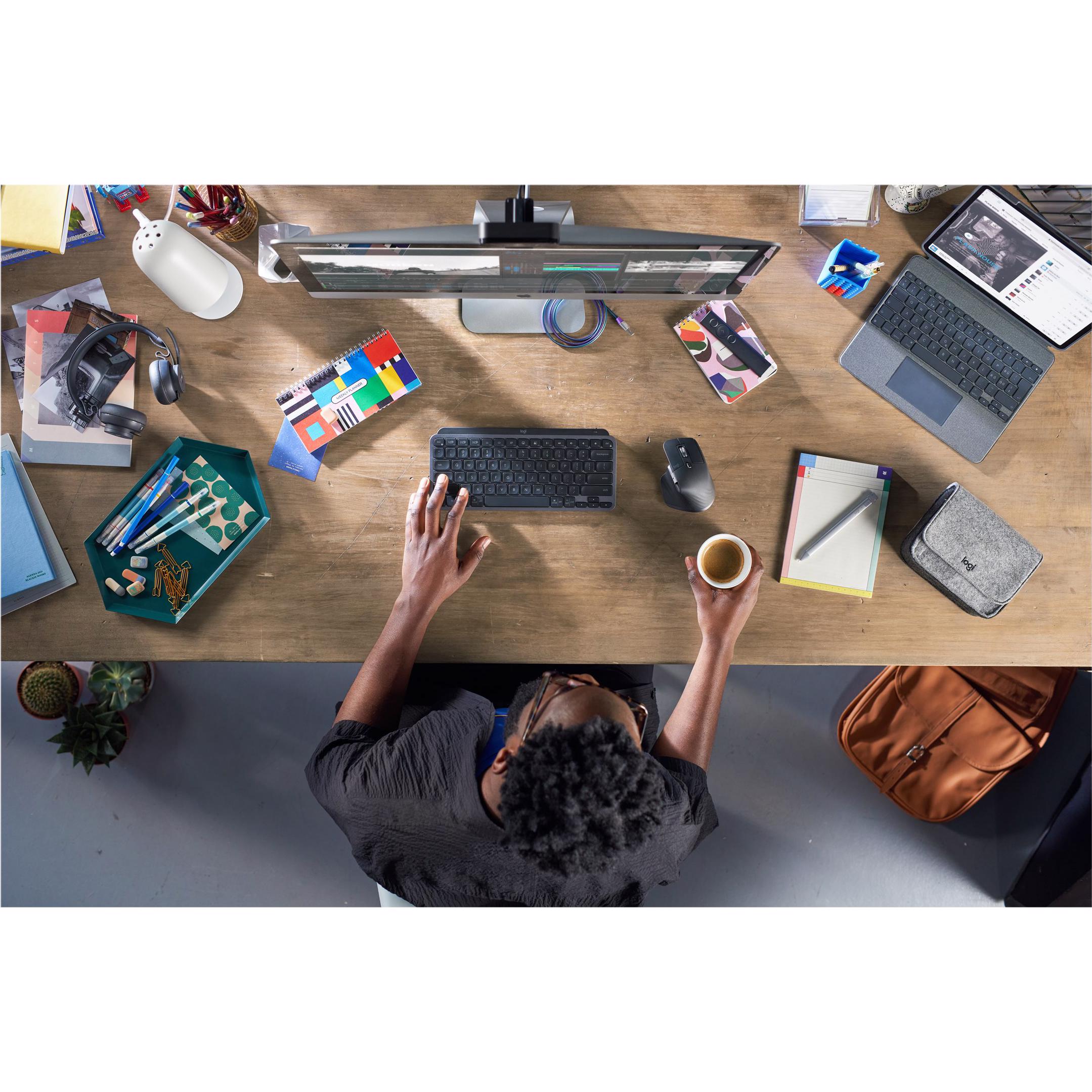 A large main feature product image of Logitech MX Keys Mini Minimalist Wireless Illuminated Keyboard - Graphite