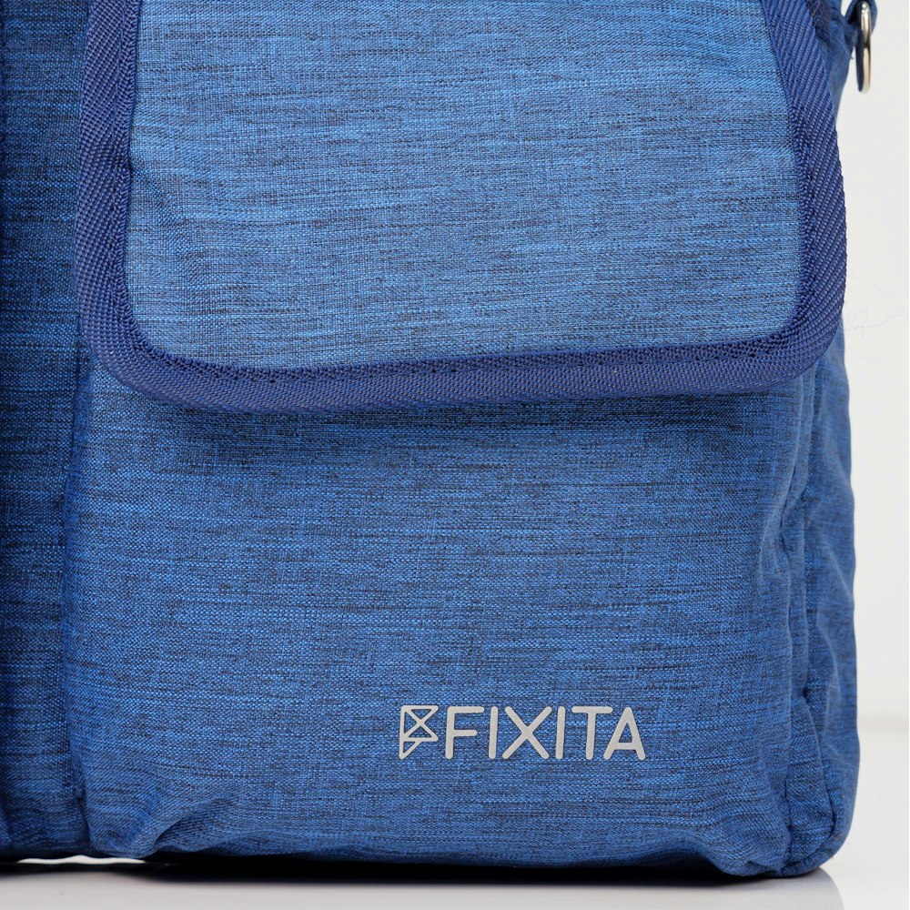 A large main feature product image of Fixita Metro 15.6" Blue Messenger Notebook Bag