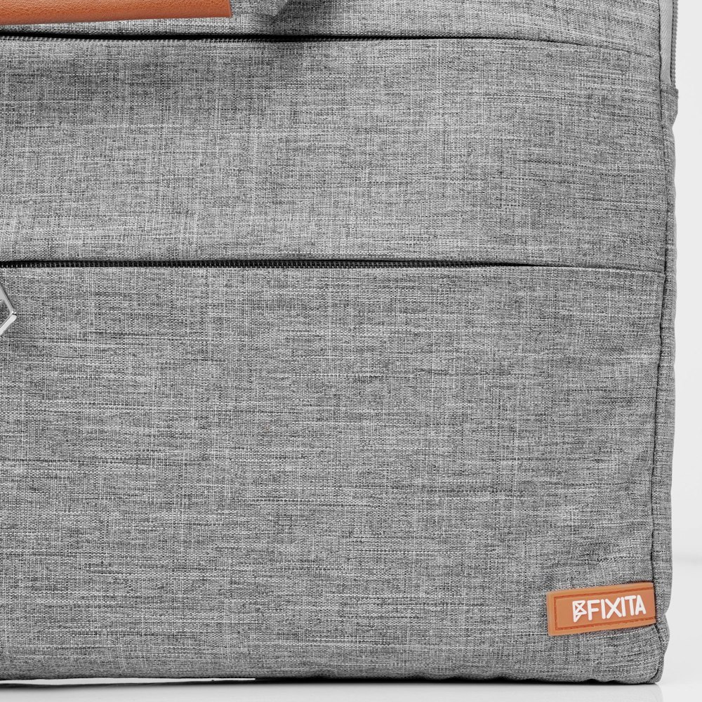 A large main feature product image of Fixita Vast Metro 17.3" Grey Messenger Notebook Bag