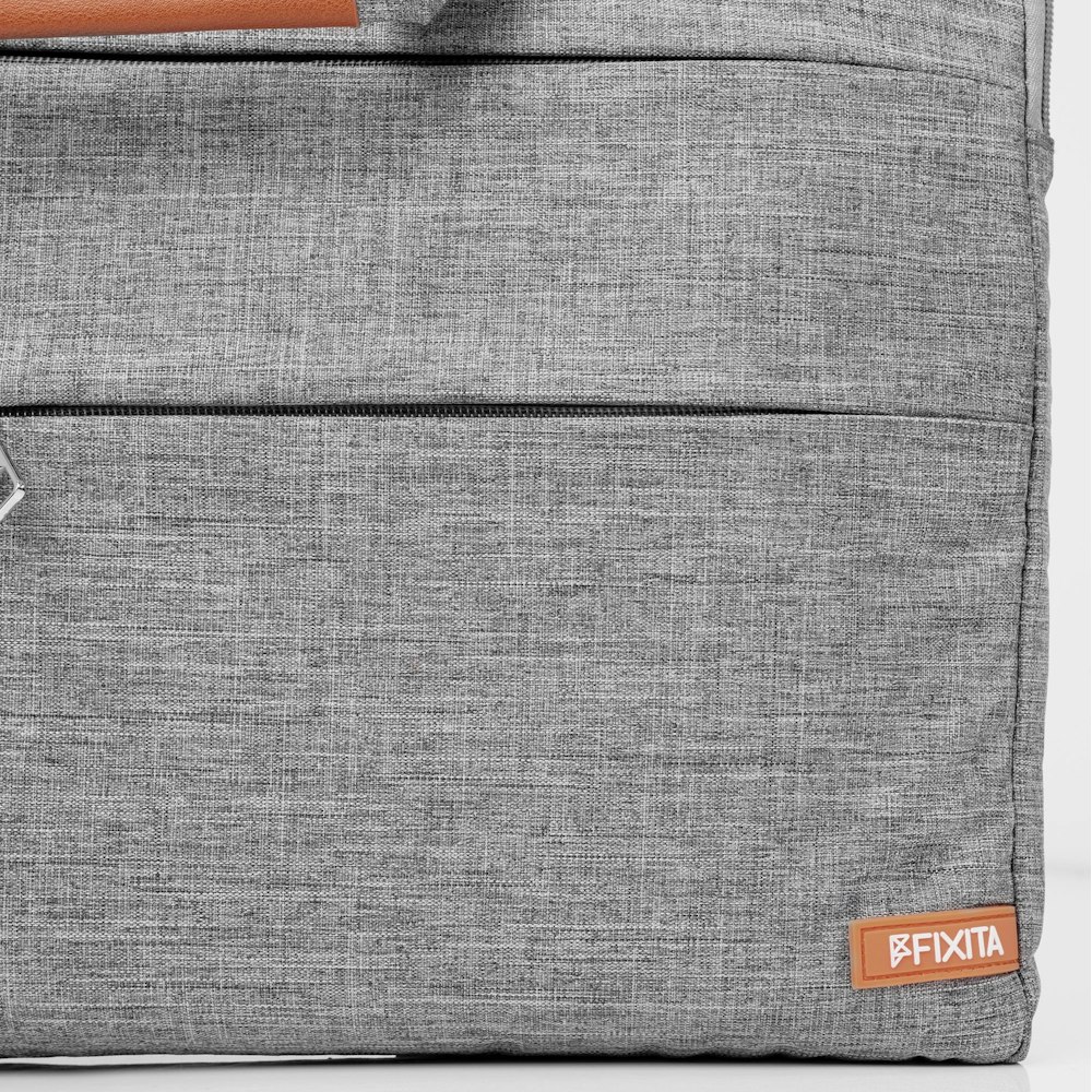 A large main feature product image of Fixita Vast Metro 17.3" Grey Messenger Notebook Bag