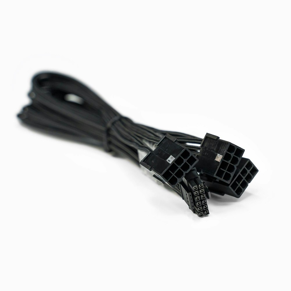 A large main feature product image of GamerChief 12VHPWR 450W 3x8-Pin 45cm Sleeved Extension Cable (Black)