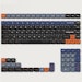 A product image of Keytok x NuPhy Space Engineer Dark - Dye-Sub PBT Low-Profile Keycap Set (117pcs)