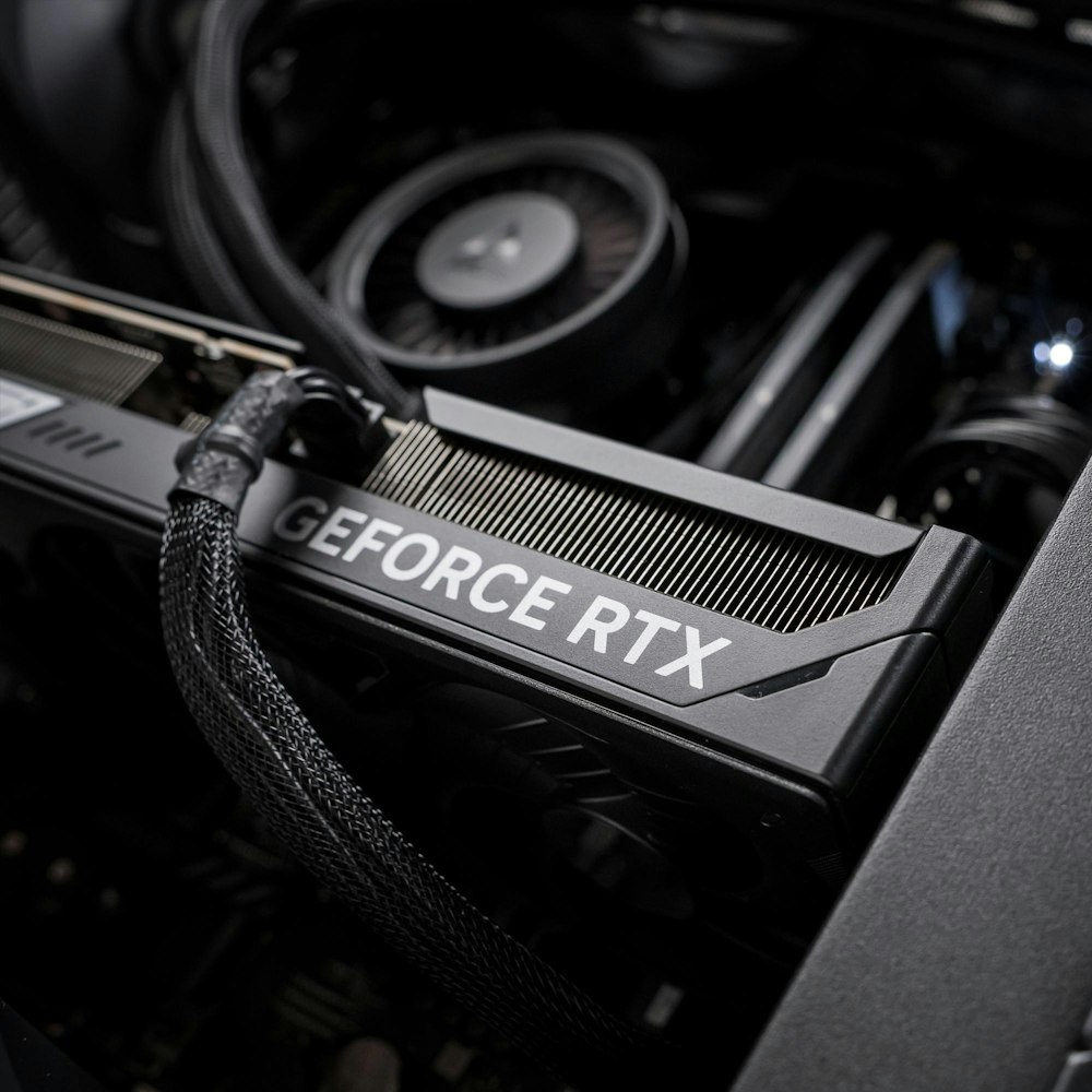 A large main feature product image of PLE Blackout RTX 5080 Prebuilt Ready to go Gaming PC