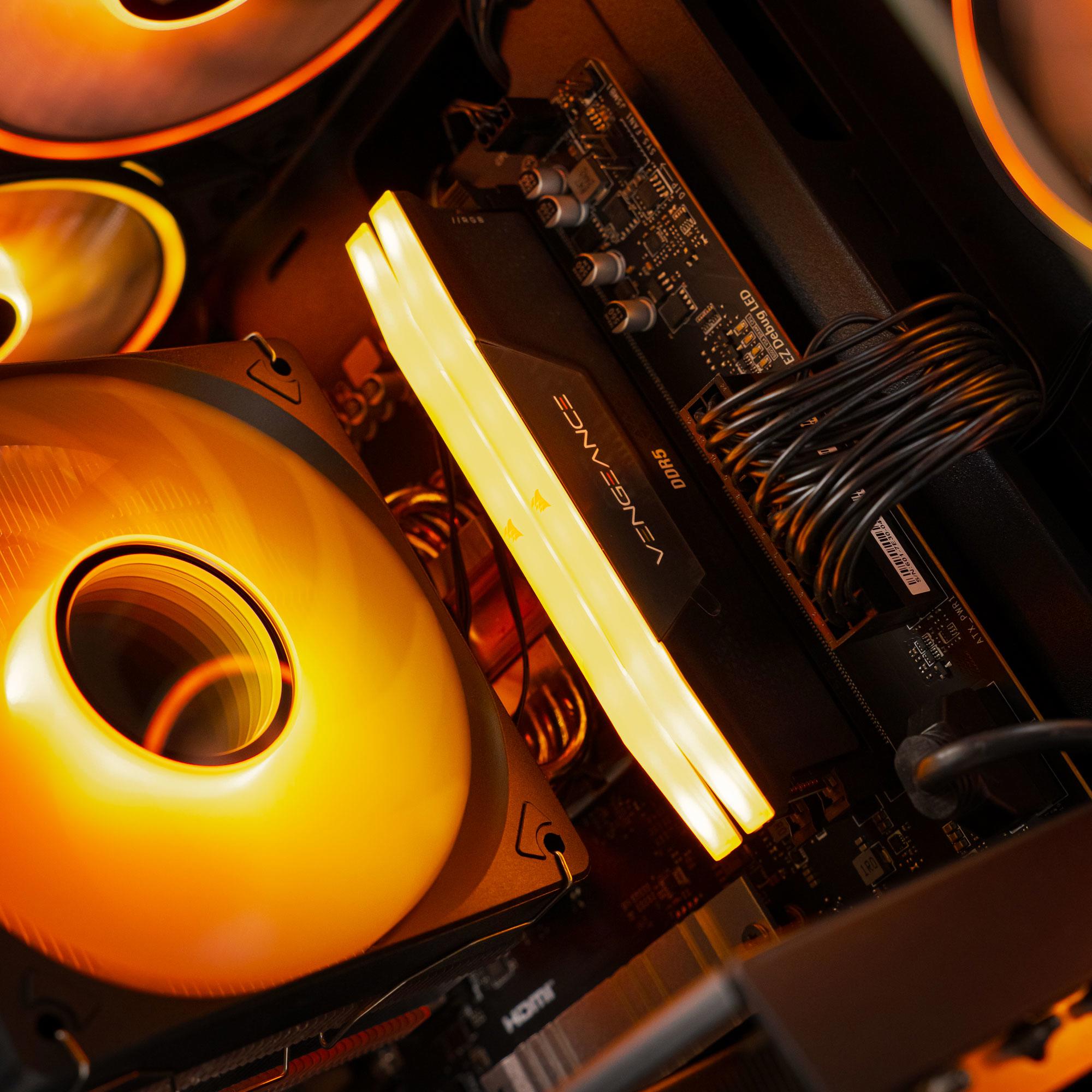 A large main feature product image of EX-DEMO PLE Ember RX 9060 XT Prebuilt Ready To Go Gaming PC