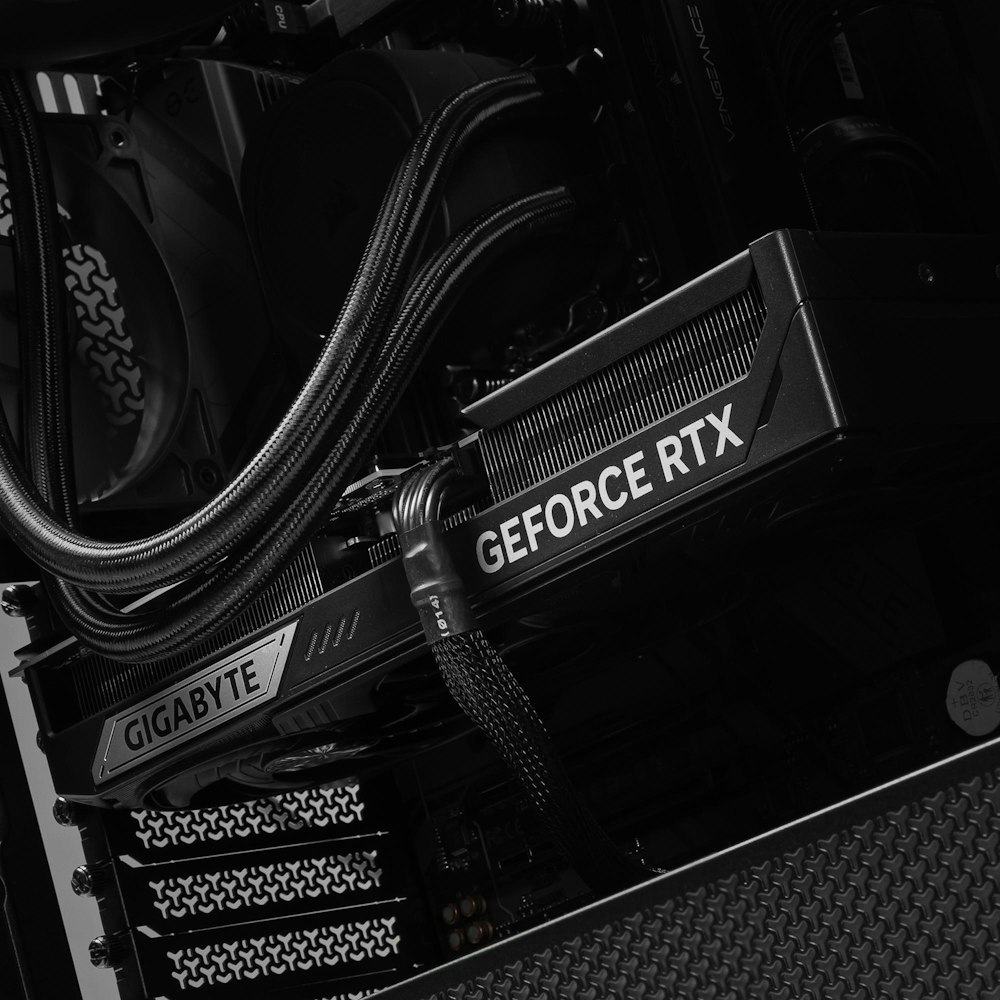 A large main feature product image of PLE Blackout RTX 5080 Prebuilt Ready To Go Gaming PC