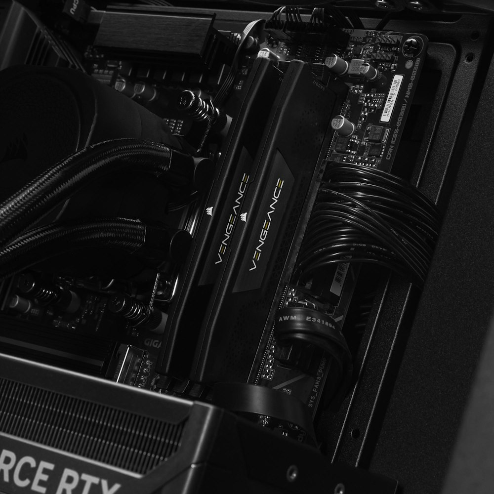 A large main feature product image of PLE Blackout RTX 5080 Prebuilt Ready To Go Gaming PC