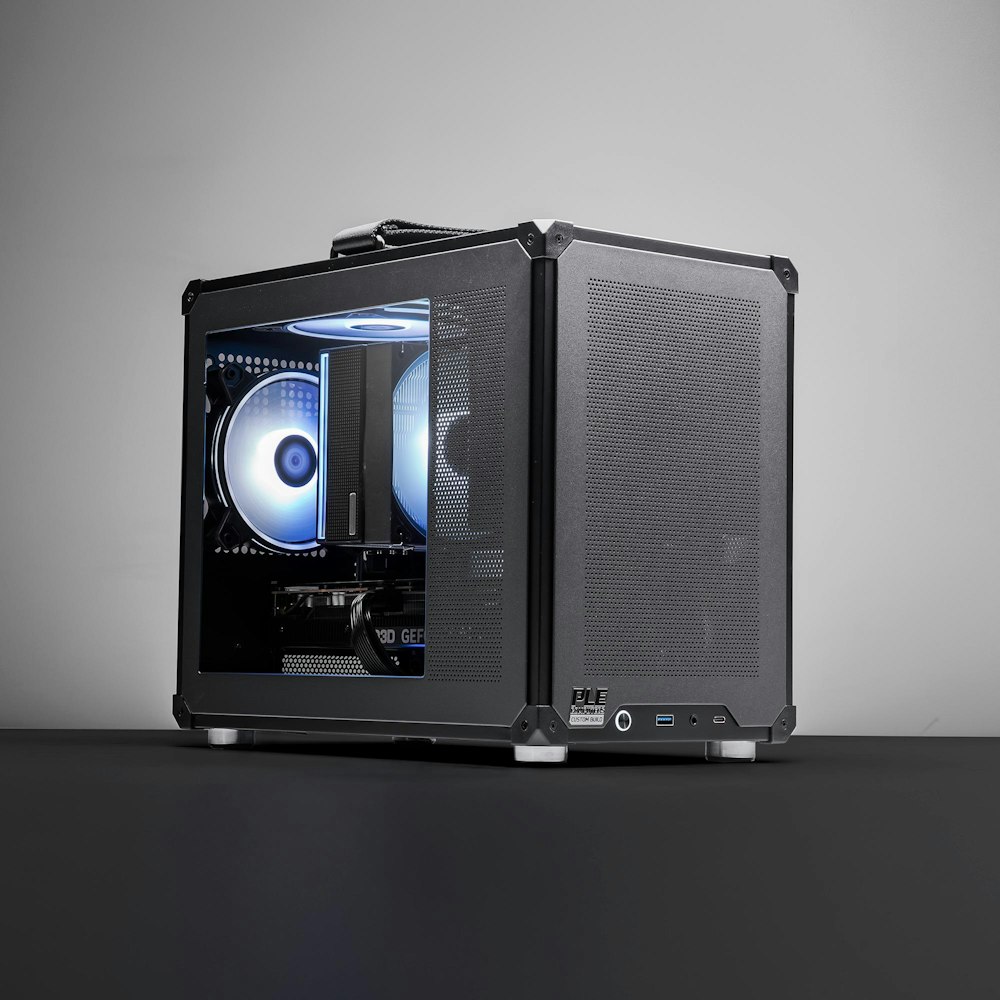 A large main feature product image of PLE Turret RTX 5060 Ti Prebuilt Ready To Go Gaming PC