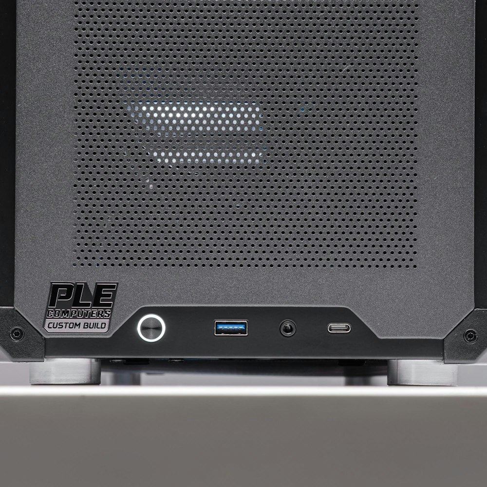 A large main feature product image of PLE Turret RTX 5060 Ti Prebuilt Ready To Go Gaming PC