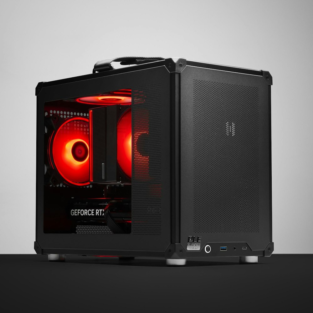 A large main feature product image of PLE Fortress RTX 5060 Ti Prebuilt Ready To Go Gaming PC