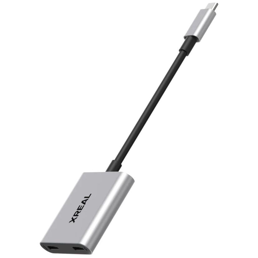 A large main feature product image of XREAL Hub Power Play USB-C Adapter