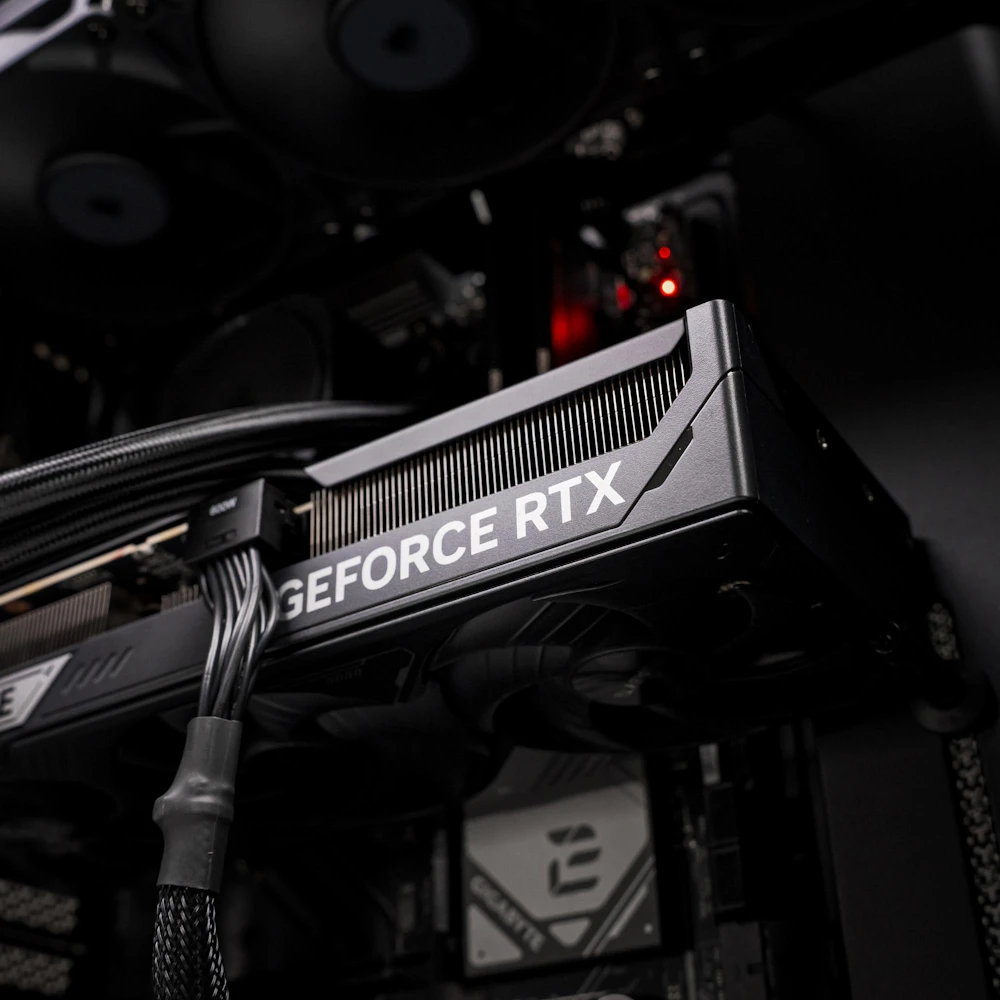 A large main feature product image of PLE Blackout RTX 5080 Prebuilt Ready To Go Gaming PC